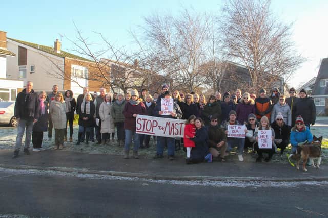 Residents came together to protest the planned mast.