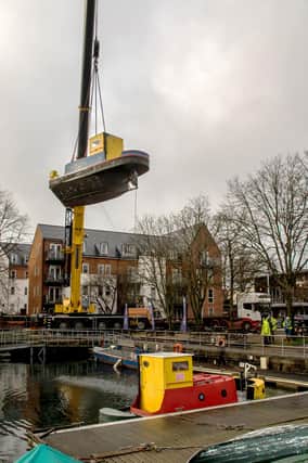 Three boats were seen up in the air over Chichester as the city’s Canal Trust performed boat inspections. Picture by David G Standley