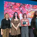 Anna Smith, host at the awards (left) plus Cherry Ellis (second from right) plus other winners. Pic by Frank Noon
