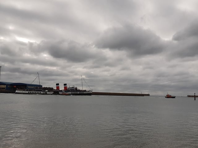 Amazing, stunning, emotional - the large crowd that stood on Kingston Beach to watch the world’s last seagoing paddle steamer make its inaugural visit to Shoreham was visibly moved by the sight of the Waverley making its way in and out of the harbour on Wednesday, September 13.