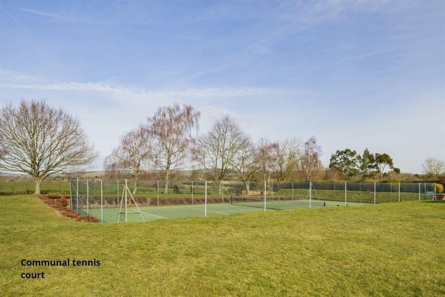 As well as countryside views, galore, the property also comes with access to a tennis court.