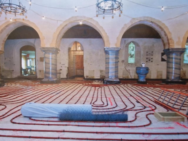 A modern underfloor heating system was installed before a new stone floor was laid
