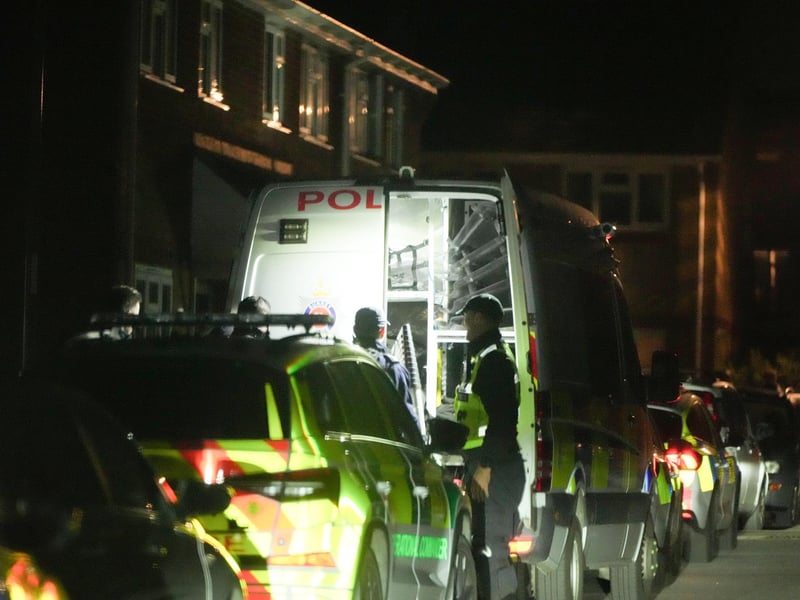 Police at the scene during the night. Picture: Sussex News and Pictures