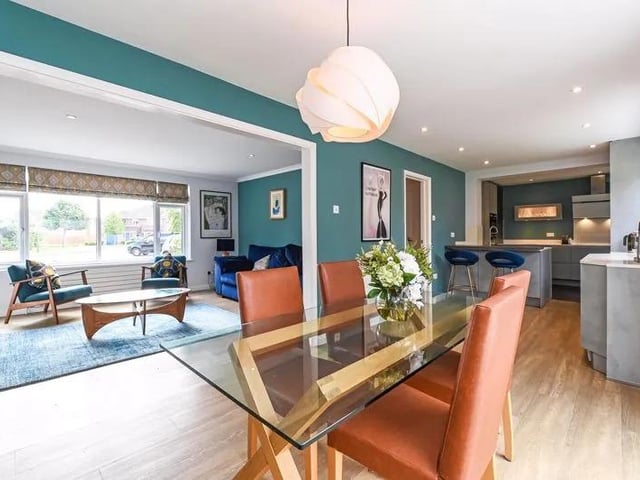 The open plan kitchen and dining room is perfect for entertaining guests.