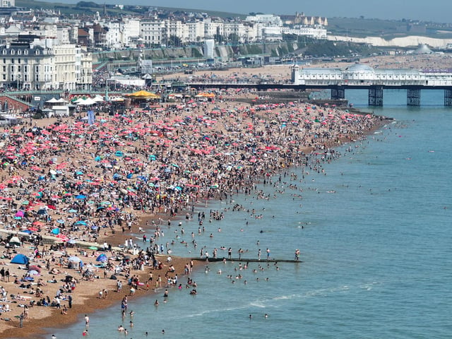 Families, groups of friends and tourists packed the seafront throughout the day, with many making the most of the sunshine by swimming in the sea, sunbathing, and queuing for ice creams and drinks along the promenade.