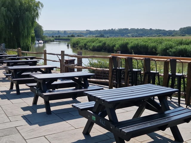 Sit by the river and enjoy the views while you eat