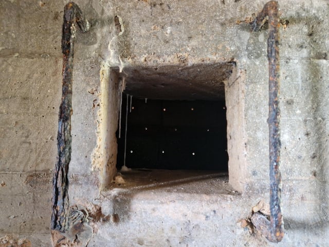 Pete Coe, one of the project leaders, and fellow former Royal Engineer Graham Cosham worked together to open the southern embrasure at the Ferring pillbox