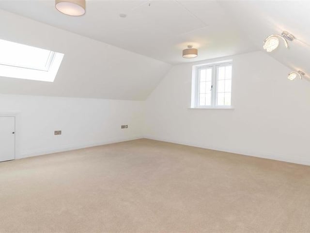 Offers in excess of £900,000 are invited for this new luxury property in Mill Lane, High Salvington. It has beautiful views over the South Downs, versatile and spacious accommodation.