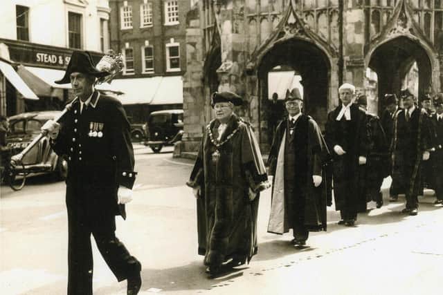 Mayor Alice Eastland passing Chichester Cross in procession, 1953-54. Picture: The Novium Museum
