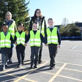 Fairway Infant School pupils and staff in their new hi-vis jackets