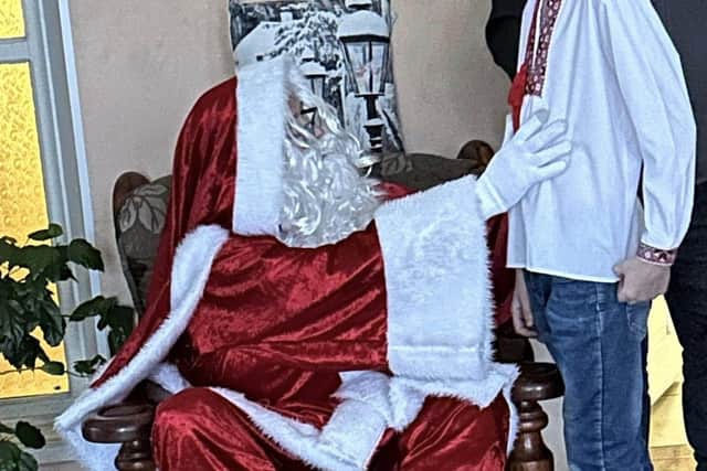 Santa passing out presents