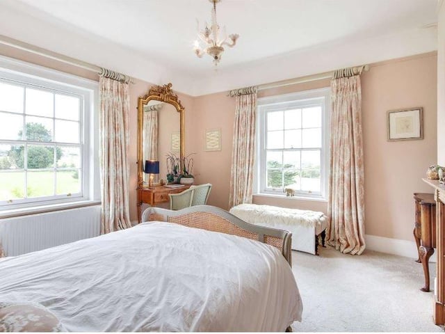 The guest bedroom has an equally stylish en suite shower room with the remaining bedrooms served by two further bathrooms