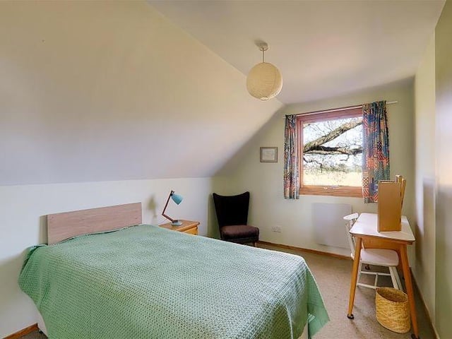 The bedrooms have part sloping ceilings