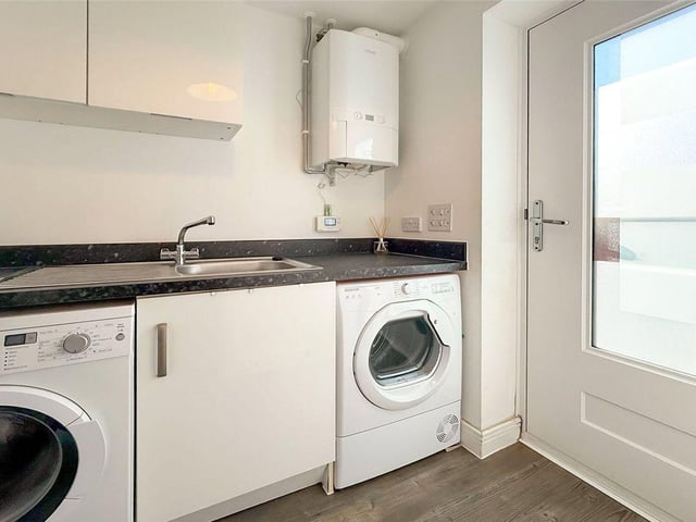 There is a separate utility room, adding further practicality