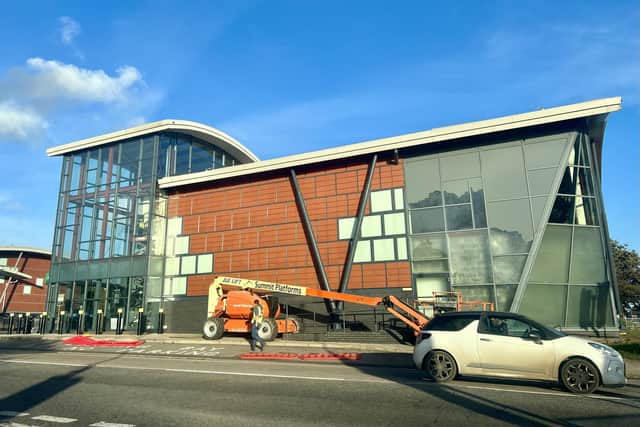 Workmen have been pictured at the former Argos store in Worthing’s Red Square Retail Park. Photo: Eddie Mitchell