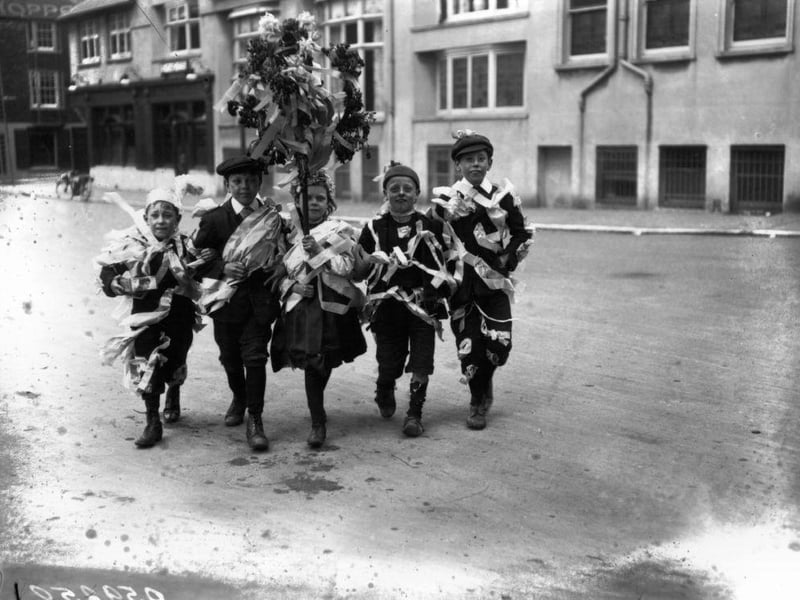 A group of children in Brighton celebrating May Day in 1914.