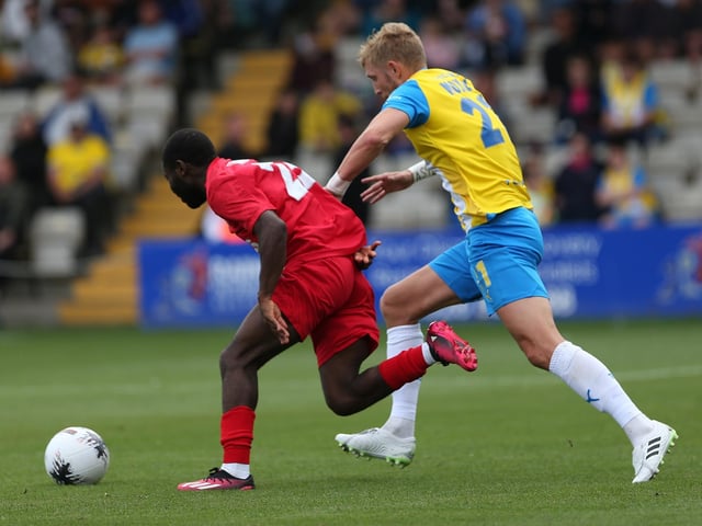 Action from Worthing's 3-0 win at Torquay United which put them top of National League South