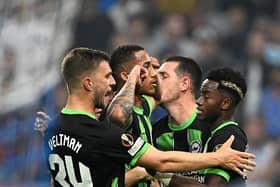 Joao Pedro of Brighton & Hove Albion celebrates with teammates after scoring the team's second goal during the UEFA Europa League at Olympique de Marseille