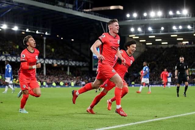 Evan Ferguson of Brighton & Hove Albion celebrates after scoring the team's second goal during the Premier League match at Everton