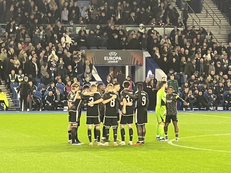 The Ajax squad go into a huddle just before kick-off. Brighton breezed past the visitors with a 2-0 win.