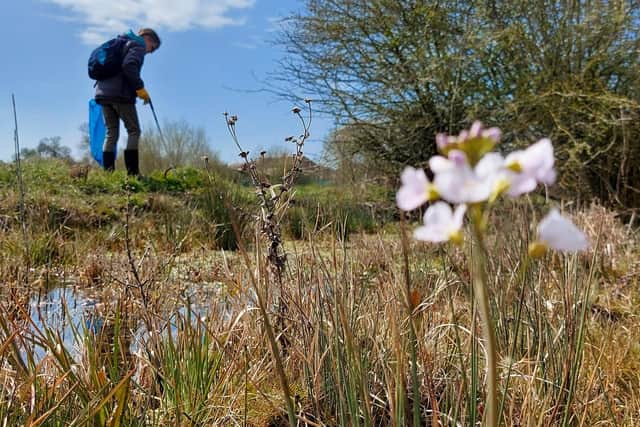 Clearing our rivers of litter.