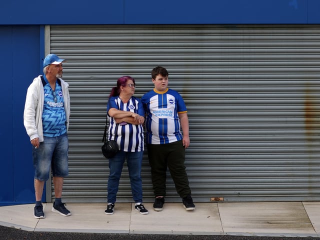 BRIGHTON, ENGLAND - OCTOBER 29: Brighton & Hove Albion fans arrive at the stadium prior to the Premier League match between Brighton & Hove Albion and Chelsea FC at American Express Community Stadium on October 29, 2022 in Brighton, England. (Photo by Alex Pantling/Getty Images)
