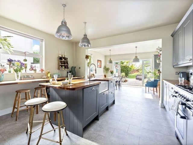 The recently-refitted kitchen is the heart of the home