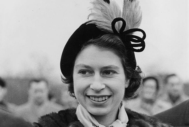 Princess Elizabeth, as was, wearing a feathered hat as she visits Crawley New Town to open a new road in the Industrial area of the town in1950.