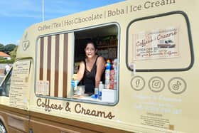 Elley Grace serves Sussex Ice Cream Company flavours in cones and tubs at Coffees and Creams. Picture: Elaine Hammond / Sussex World