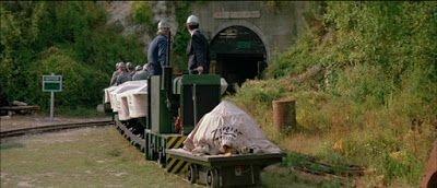 A still from a scene in A View to a Kill that features the Quarry Tunnel at Amberley Museum