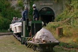 A still from a scene in A View to a Kill that features the Quarry Tunnel at Amberley Museum