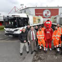 Councillor Bob Noyce, third from right, with Reggie the Red at Broadfield Stadium.
