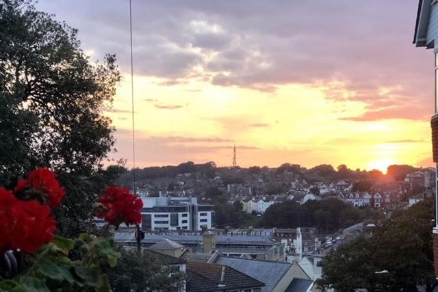The flat has sunset views across the town