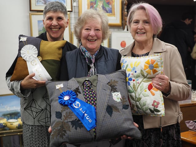 Mercedes Ferrari-Plumridge (left) and Joyce Bellingham (right) with first place winner Barbara Bradley at St Peter and St James Hospice shop in South Road, Haywards Heath