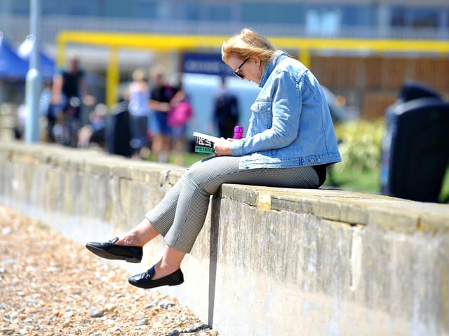Enjoying the heatwave on Worthing beach. Pic S Robards SR2206152