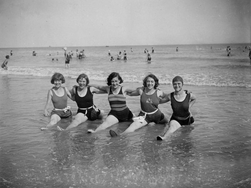 Five happy bather doing the 'splits' in the sea at Eastbourne on 9th August 1930: