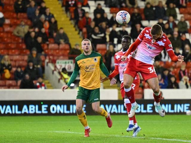 Max Watters of Barnsley scores to make it 1-0 during the Emirates FA Cup First Round match between Barnsley and Horsham at Oakwell Stadium.