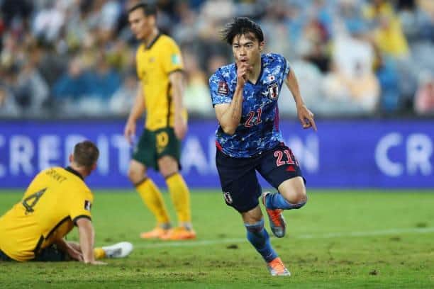 Brighton & Hove Albion star Kaoru Mitoma celebrates scoring during the FIFA World Cup Qatar 2022 AFC Asian Qualifying match between Australia and Japan in March. Picture by Mark Metcalfe/Getty Images