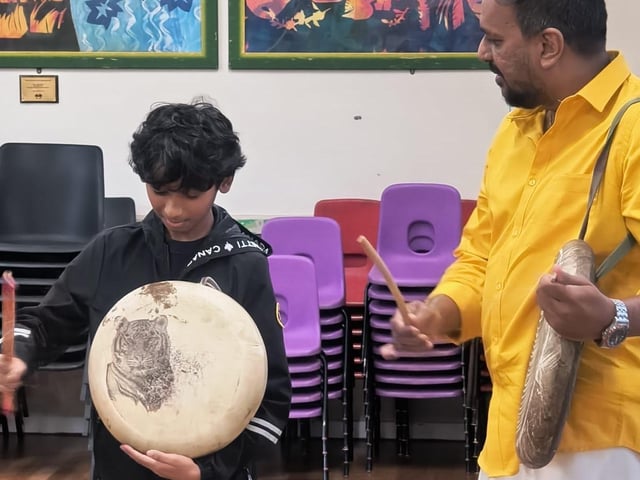 Children and adults came together in Crawley to discover the powerful rhythms of Parai, a traditional Tamil drumming art form, at a community workshop organised by Aurvi Collective