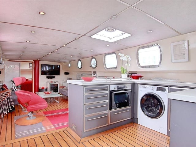 This stunning seafaring Dutch barge houseboat on a private mooring on the River Arun has come on the market with Michael Jones Estate Agents with a guide price of £275,000