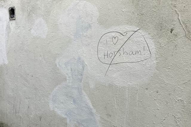 All that now remains of the Banksy-style mural in Horsham town centre. Photo: Sarah Page