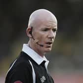 Referee Dermot Gallagher wears a communication headset during the Barclays Premiership match between Watford and Middlesbrough at Vicarage Road on November 4, 2006 in Watford, England.  (Photo by Richard Heathcote/Getty Images)
