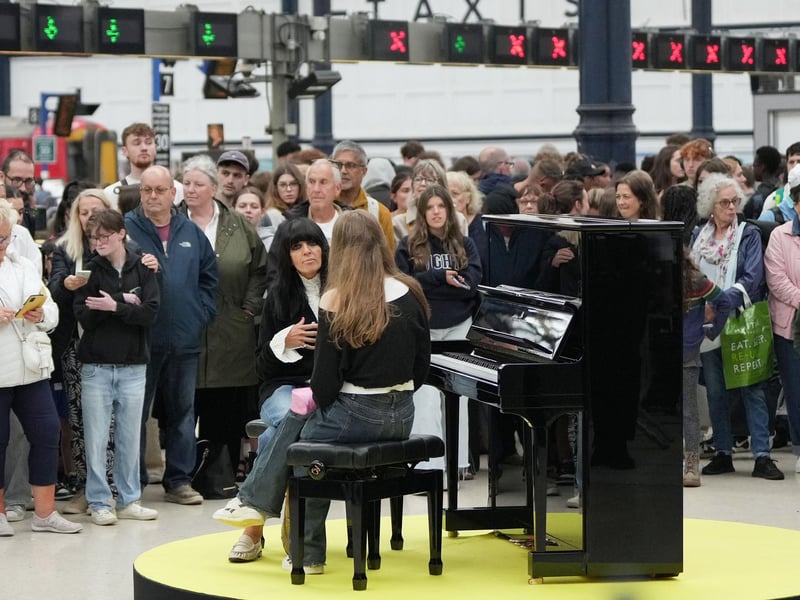 Claudia Winkleman has been pictured at Brighton railway station as her search continues to find more of the UK's most exciting amateur pianists.