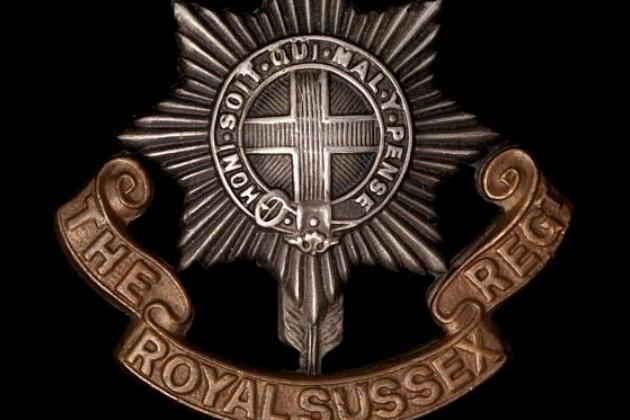 A Royal Sussex Regiment cap badge
