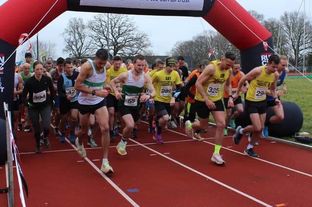 Mike Houston - left of picture - is away quickly for Chi Runners at Crawley | Picture by Semeena Khan