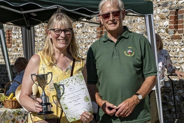 Lindy Hinsley-Wintle receives the Cactus Cup from Colin Crane at East Preston and Kingston Horticultural Society flower show