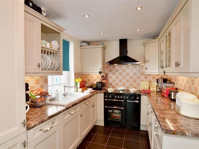 This two-bedroom cottage is on the market at £600,000 with Cubitt & West. This is a rare opportunity to own a charming riverside cottage within the desirable conservation area of historic Arundel.
