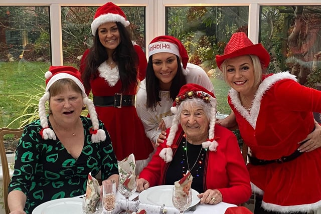 Crawley resident Joan Izzard celebrates her 100th birthday on Wednesday, February 7. Here she is pictured celebrating Christmas with her family