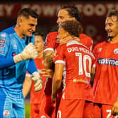 Vito Mannone celebrates with Stephen Duke-McKenna after one of his stunning strikes | Picture: Kyle Hemsley
