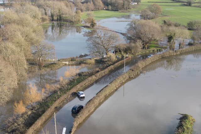 Cars have been abandoned in Barcombe Mills after the River Ouse burst its banks and flooded the roads.